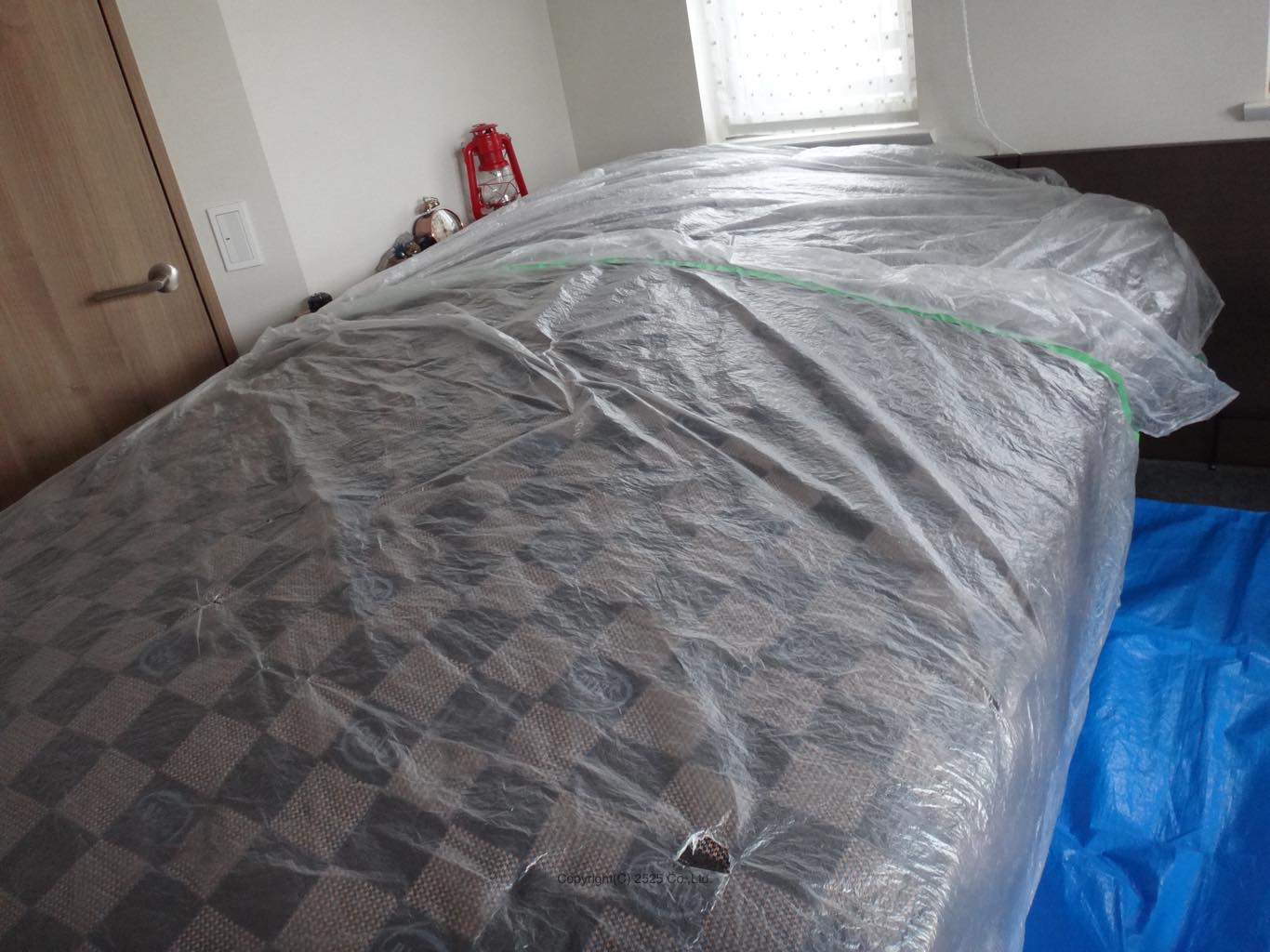 使い捨て養生シートでの保護